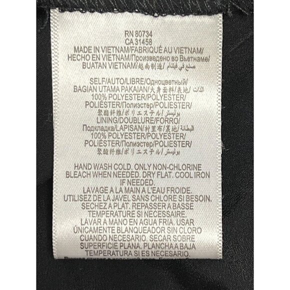 BCBGeneration Mini Skirt Size 0 Black Shine Lasercut Eyelet Back Zip NWT - Picture 7 of 10